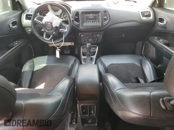 2021 Jeep Compass Latitude with VIN 3C4NJCBB0MT505824, listed as a Copart auction lot 53182825 with 124,628 mi miles and Salvage title. Bid and sale history available at DreamBid. Image 8.
