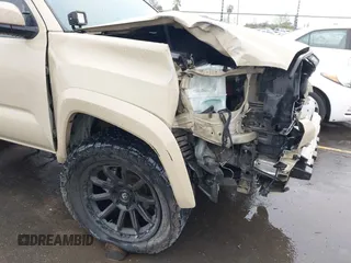 2016 Toyota Tacoma SR5 with VIN 3TMDZ5BN3GM003351, listed as a IAAI auction lot 41721932 with 100,774 mi miles and . Bid and sale history available at DreamBid. Image 19.