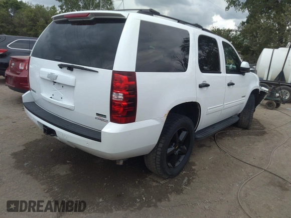 2010 Chevrolet Tahoe LS with VIN 1GNUKAE09AR265739, listed as a IAAI auction lot 36547416 with 153,964 mi miles and . Bid and sale history available at DreamBid. Image 4.