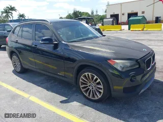 2013 BMW X1 28i with VIN WBAVM1C55DVW43523, listed as a IAAI auction lot 42099204 with 108,566 mi miles. Bid and sale history available at carsss.com. Image 1.