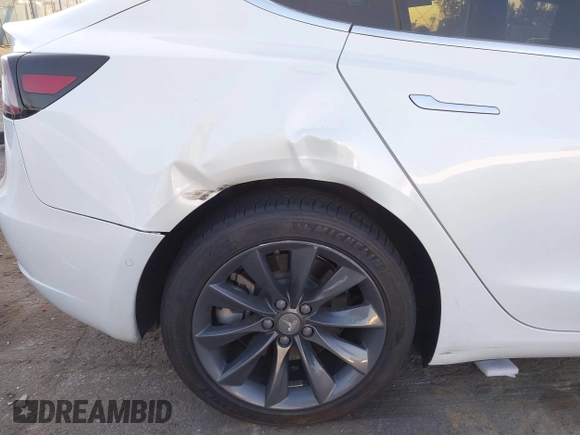 2020 Tesla Model 3 Performance with VIN 5YJ3E1EC1LF602516, listed as a IAAI auction lot 41841216 with 28,967 mi miles and . Bid and sale history available at DreamBid. Image 21.