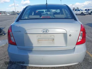2006 Hyundai Accent GLS with VIN KMHCN46C86U007833, listed as a IAAI auction lot 41760603 with 60,030 mi miles. Bid and sale history available at carsss.com. Image 16.