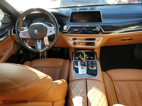 2021 BMW 7 Series 750i xDrive with VIN WBA7U2C02MCF77496, listed as a Copart auction lot 82527814 with 0 mi miles and Salvage Title. Bid and sale history available at carsss.com. Image 8.