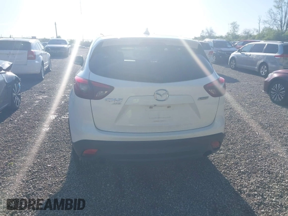2016 Mazda CX-5 Grand Touring with VIN JM3KE4DY1G0680431, listed as a IAAI auction lot 42136637 with 166,348 mi miles. Bid and sale history available at carsss.com. Image 17.