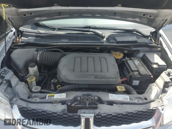 2019 Dodge Grand Caravan SE with VIN 2C4RDGBG2KR777707, listed as a Copart auction lot 46870455 with 129,404 mi miles and Clean Title. Bid and sale history available at DreamBid. Image 12.