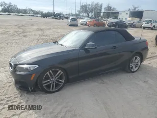 2015 BMW 2 Series 228i with VIN WBA1K5C58FV473768, listed as a Copart auction lot 78167264 with 58,909 mi miles and Salvage Title. Bid and sale history available at carsss.com. Image 1.