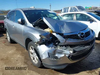 2011 Mazda CX-9 Touring with VIN JM3TB2CAXB0332478, listed as a IAAI auction lot 41659598 with 122,290 mi miles and . Bid and sale history available at DreamBid. Image 1.