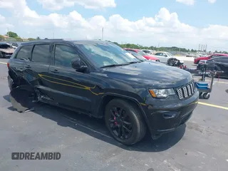 2021 Jeep Grand Cherokee Laredo E with VIN 1C4RJEAG7MC844473, listed as a IAAI auction lot 42319716 with 90,449 mi miles and . Bid and sale history available at DreamBid. Image 1.