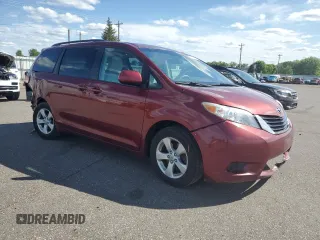 2012 Toyota Sienna LE AAS with VIN 5TDKK3DC7CS195590, listed as a Copart auction lot 57968415 with 201,732 mi miles and Salvage title. Bid and sale history available at DreamBid. Image 4.