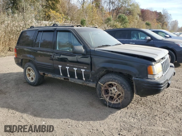 1998 Jeep Grand Cherokee Laredo with VIN 1J4GZ48YXWC299827, listed as a Copart auction lot 76898264 with 232,656 mi miles and Clean Title. Bid and sale history available at carsss.com. Image 4.