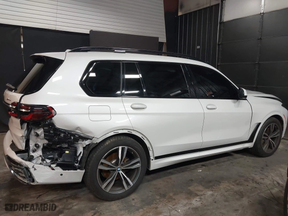 2023 BMW X7 xDrive40i with VIN 5UX23EM04P9P96036, listed as a IAAI auction lot 41235512 with 35,661 mi miles. Bid and sale history available at carsss.com. Image 14.