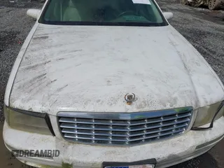 1999 Cadillac DeVille z VIN 1G6KD54Y5XU780836, wystawiony jako IAAI lot #41986180 z przebiegiem Nie podano mil oraz . Historia ofert i sprzedaży dostępna na DreamBid. Obrazek 6.
