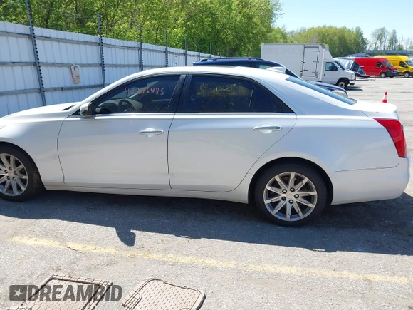 2015 Cadillac CTS Luxury AWD with VIN 1G6AX5SX5F0103725, listed as a IAAI auction lot 42226485 with 112,437 mi miles and . Bid and sale history available at DreamBid. Image 14.