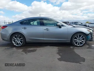 2014 Mazda 6 i Grand Touring with VIN JM1GJ1W57E1104801, listed as a IAAI auction lot 42060144 with 95,212 mi miles. Bid and sale history available at carsss.com. Image 14.