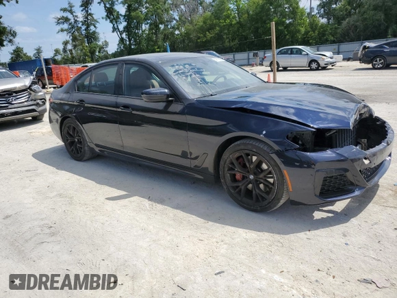 2023 BMW 5 Series 530i with VIN WBA53BH04PWY02486, listed as a Copart auction lot 54519385 with 26,979 mi miles and Salvage title. Bid and sale history available at DreamBid. Image 4.