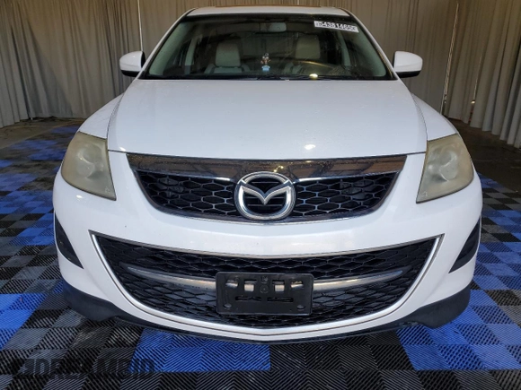2012 Mazda CX-9 Touring z VIN JM3TB3CV8C0349676, wystawiony jako Copart lot #54381465 z przebiegiem 199 970 mil mil oraz Czysty tytuł • Clean title. Historia ofert i sprzedaży dostępna na DreamBid. Obrazek 5.
