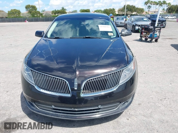 2014 Lincoln MKS with VIN 1LNHL9EK0EG608300, listed as a IAAI auction lot 41900902 with 144,253 mi miles. Bid and sale history available at carsss.com. Image 12.