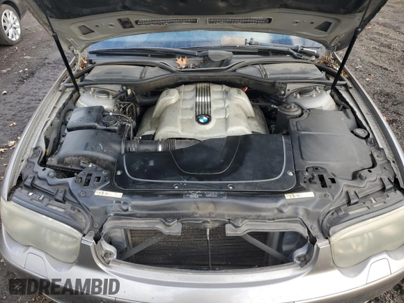 2004 BMW 7 Series 745i with VIN WBAGL63444DP71760, listed as a Copart auction lot 82377444 with 289,762 mi miles and Salvage Title. Bid and sale history available at DreamBid. Image 11.