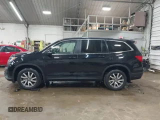 2020 Honda Pilot EX-L z VIN 5FNYF6H58LB061994, wystawiony jako IAAI lot #42358236 z przebiegiem 49 436 mil mil oraz . Historia ofert i sprzedaży dostępna na DreamBid. Obrazek 14.