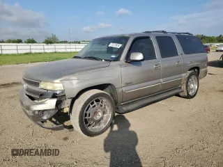 2000 Chevrolet Suburban LT with VIN 3GNEC16T0YG143890, listed as a Copart auction lot 72273534 with 242,305 mi miles and Salvage Title. Bid and sale history available at carsss.com. Image 1.