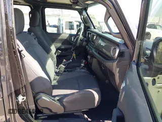 2020 Jeep Wrangler Unlimited Sahara with VIN 1C4HJXEN7LW230214, listed as a IAAI auction lot 41812466 with 59,004 mi miles. Bid and sale history available at carsss.com. Image 5.