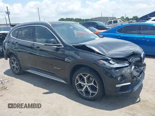 2017 BMW X1 xDrive28i with VIN WBXHT3Z30H4A65417, listed as a IAAI auction lot 42328797 with 103,788 mi miles and . Bid and sale history available at DreamBid. Image 1.