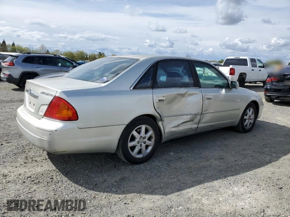 2000 Toyota Avalon XL with VIN 4T1BF28B3YU002835, listed as a Copart auction lot 50902115 with 128,699 mi miles and Salvage Title. Bid and sale history available at DreamBid. Image 3.