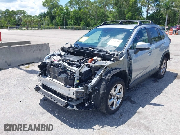 2021 Toyota RAV4 Hybrid LE with VIN 2T3B6RFV2MW018967, listed as a IAAI auction lot 42601989 with 71,046 mi miles and . Bid and sale history available at DreamBid. Image 6.