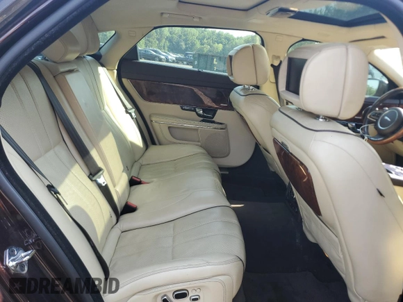 2012 Jaguar XJ Supersport z VIN SAJWA2JC4CMV21796, wystawiony jako Copart lot #66258395 z przebiegiem 122 190 mil mil oraz Czysty tytuł • Clean title. Historia ofert i sprzedaży dostępna na DreamBid. Obrazek 10.