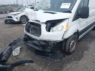 2018 Ford Transit z VIN 1FTYR2CM6JKA77870, wystawiony jako IAAI lot #42087185 z przebiegiem 142 452 mil mil oraz . Historia ofert i sprzedaży dostępna na DreamBid. Obrazek 17.