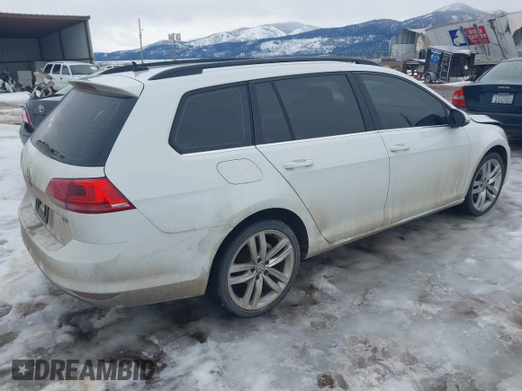 2015 Volkswagen Golf SportWagen TDI SE with VIN 3VWCA7AU0FM506614, listed as a IAAI auction lot 41552304 with 119,209 mi miles. Bid and sale history available at carsss.com. Image 4.