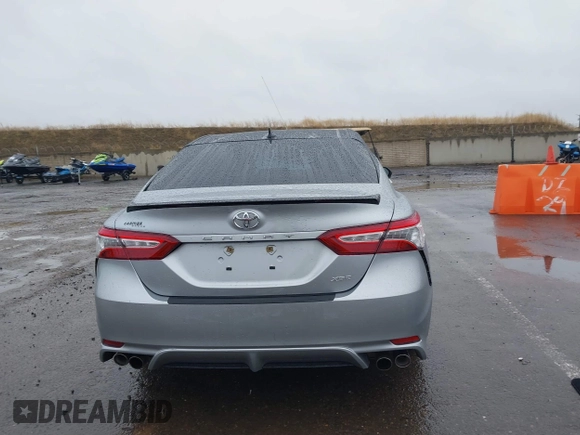2020 Toyota Camry XSE with VIN 4T1K61AK1LU318098, listed as a IAAI auction lot 41097712 with 64,118 mi miles and . Bid and sale history available at DreamBid. Image 17.