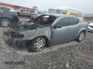 2014 Dodge Avenger SE z VIN 1C3CDZAB2EN216808, wystawiony jako Copart lot #70053644 z przebiegiem Nie podano mil oraz Nie do naprawy • Non repairable. Historia ofert i sprzedaży dostępna na DreamBid. Obrazek 1.