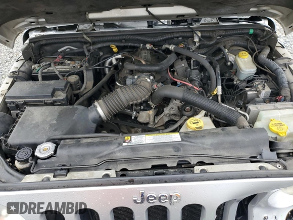 2008 Jeep Wrangler Unlimited X with VIN 1J4GB39148L565250, listed as a Copart auction lot 51170505 with 153,344 mi miles and Salvage Title. Bid and sale history available at DreamBid. Image 11.