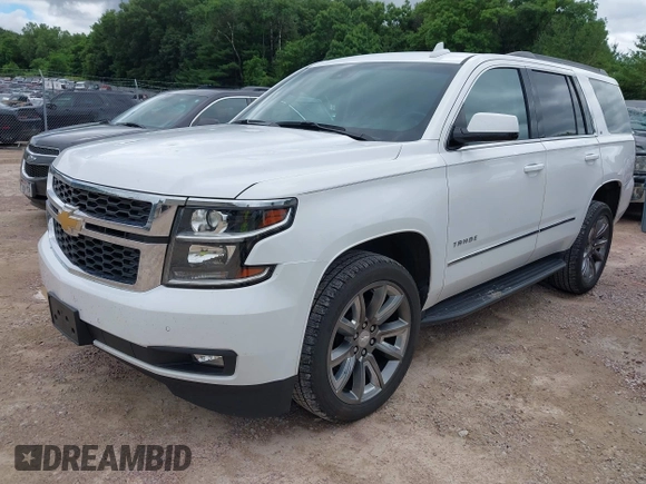 2020 Chevrolet Tahoe LT with VIN 1GNSKBKC8LR108377, listed as a IAAI auction lot 42545775 with 90,425 mi miles and . Bid and sale history available at DreamBid. Image 2.