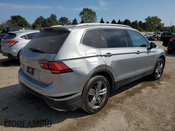 2021 Volkswagen Tiguan SE with VIN 3VV3B7AX8MM115493, listed as a Copart auction lot 71198794 with 34,958 mi miles and Salvage Title. Bid and sale history available at DreamBid. Image 3.