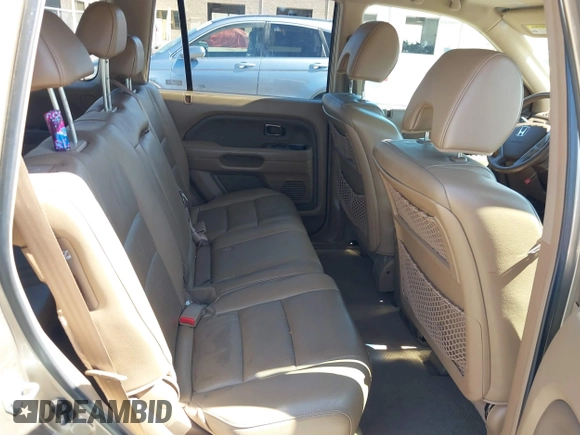 2008 Honda Pilot EX-L with VIN 5FNYF18758B012974, listed as a IAAI auction lot 41884153 with 112,165 mi miles and . Bid and sale history available at DreamBid. Image 8.