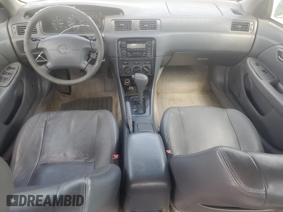 2001 Toyota Camry LE z VIN JT2BF22K310305858, wystawiony jako Copart lot #55231305 z przebiegiem 149 104 mil mil oraz Nie do naprawy • Non repairable. Historia ofert i sprzedaży dostępna na DreamBid. Obrazek 8.