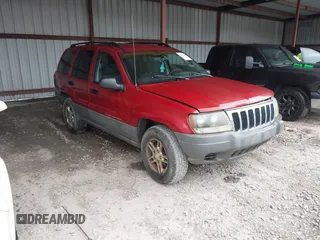 2002 Jeep Grand Cherokee Laredo with VIN 1J4GW48S32C264870, listed as a IAAI auction lot 42535548 with 237,379 mi miles and . Bid and sale history available at DreamBid. Image 1.