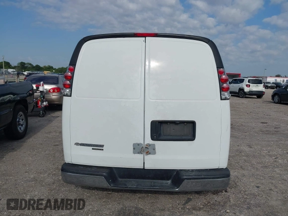 2014 Chevrolet Express Cargo Van with VIN 1GCSGAFX2E1121841, listed as a IAAI auction lot 42028712 with 164,768 mi miles. Bid and sale history available at carsss.com. Image 17.