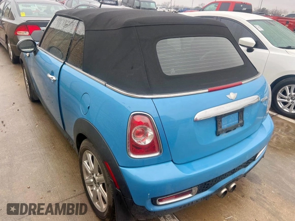 2014 MINI Convertible S z VIN WMWZP3C57ET706977, wystawiony jako Copart lot #45777855 z przebiegiem 77 175 mil mil oraz Czysty tytuł • Clean title. Historia ofert i sprzedaży dostępna na DreamBid. Obrazek 3.