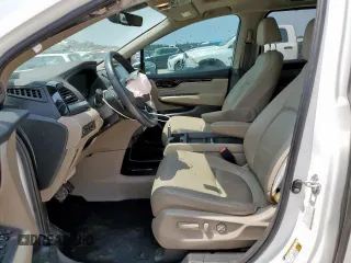 2023 Honda Odyssey Touring с VIN 5FNRL6H8XPB001311, выставлен на аукционе Copart как лот 56924345 с пробегом 77 736 миль миль и Списание • Salvage title. История ставок и продаж доступна на DreamBid. Изображение 7.