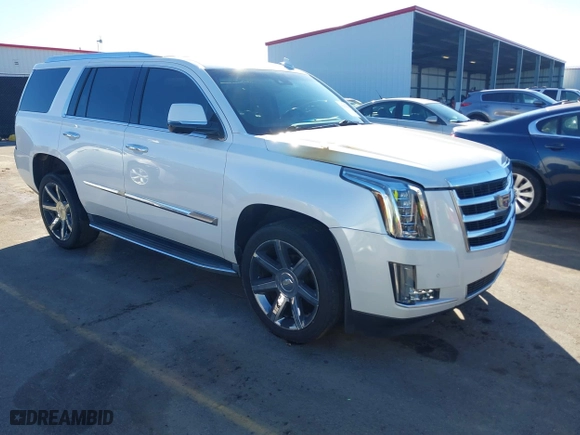 2016 Cadillac Escalade Luxury Collection with VIN 1GYS4BKJ4GR339343, listed as a IAAI auction lot 41456214 with 114,777 mi miles. Bid and sale history available at carsss.com. Image 1.