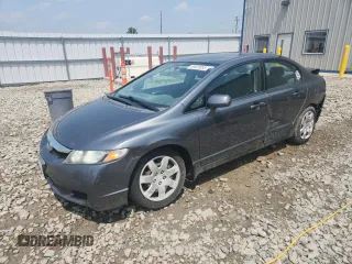 2009 Honda Civic LX z VIN 2HGFA16559H307125, wystawiony jako Copart lot #59625885 z przebiegiem 89 986 mil mil oraz Nie do naprawy • Non repairable. Historia ofert i sprzedaży dostępna na DreamBid. Obrazek 1.