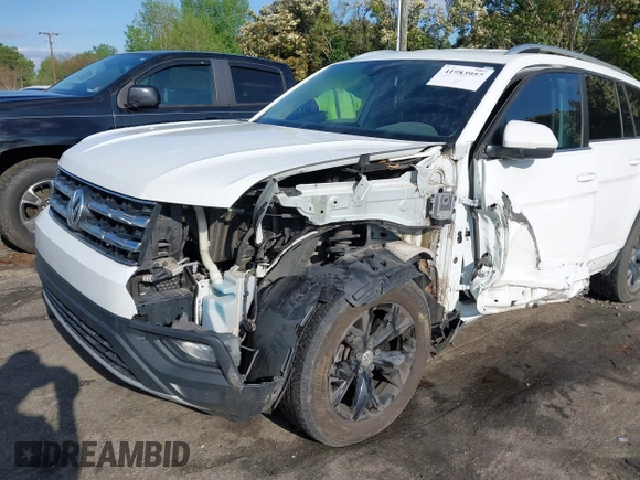 2018 Volkswagen Atlas SE with VIN 1V2CR2CAXJC548220, listed as a IAAI auction lot 41983957 with 118,371 mi miles and . Bid and sale history available at DreamBid. Image 6.