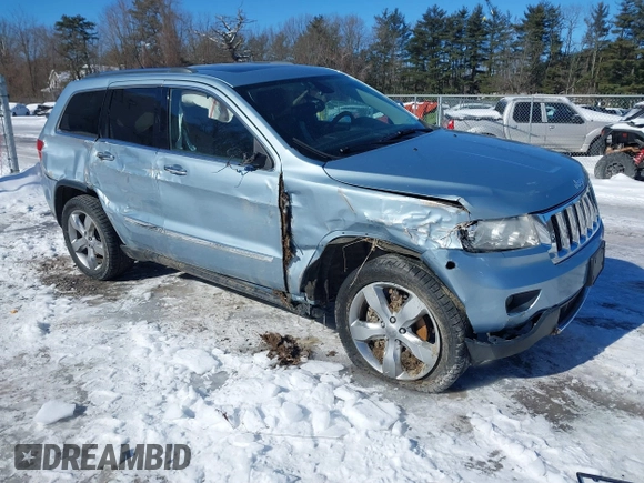2013 Jeep Grand Cherokee Overland with VIN 1C4RJFCTXDC541770, listed as a IAAI auction lot 41610600 with 164,065 mi miles. Bid and sale history available at carsss.com. Image 1.