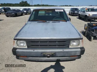 1993 Mazda B-Series Truck z VIN JM2UF3130P0378304, wystawiony jako Copart lot #58799925 z przebiegiem 132 801 mil mil oraz Szkoda całkowita • Salvage title. Historia ofert i sprzedaży dostępna na DreamBid. Obrazek 5.