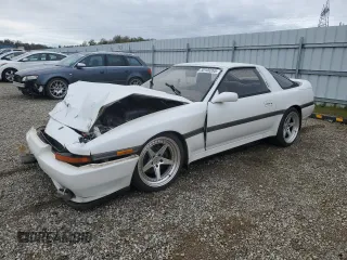 1989 Toyota Supra z VIN JT2MA71J4K0108986, wystawiony jako Copart lot #50100265 z przebiegiem 189 982 mil mil oraz Szkoda całkowita • Salvage title. Historia ofert i sprzedaży dostępna na DreamBid. Obrazek 1.