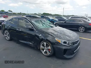 2018 Kia Optima SX with VIN 5XXGW4L28JG238289, listed as a IAAI auction lot 42383283 with 83,877 mi miles and . Bid and sale history available at DreamBid. Image 1.