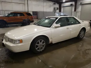 1997 Cadillac Seville STS z VIN 1G6KY5292VU840908, wystawiony jako Copart lot #54541535 z przebiegiem 80 325 mil mil oraz Szkody całkowita. Historia ofert i sprzedaży dostępna na DreamBid. Obrazek 1.